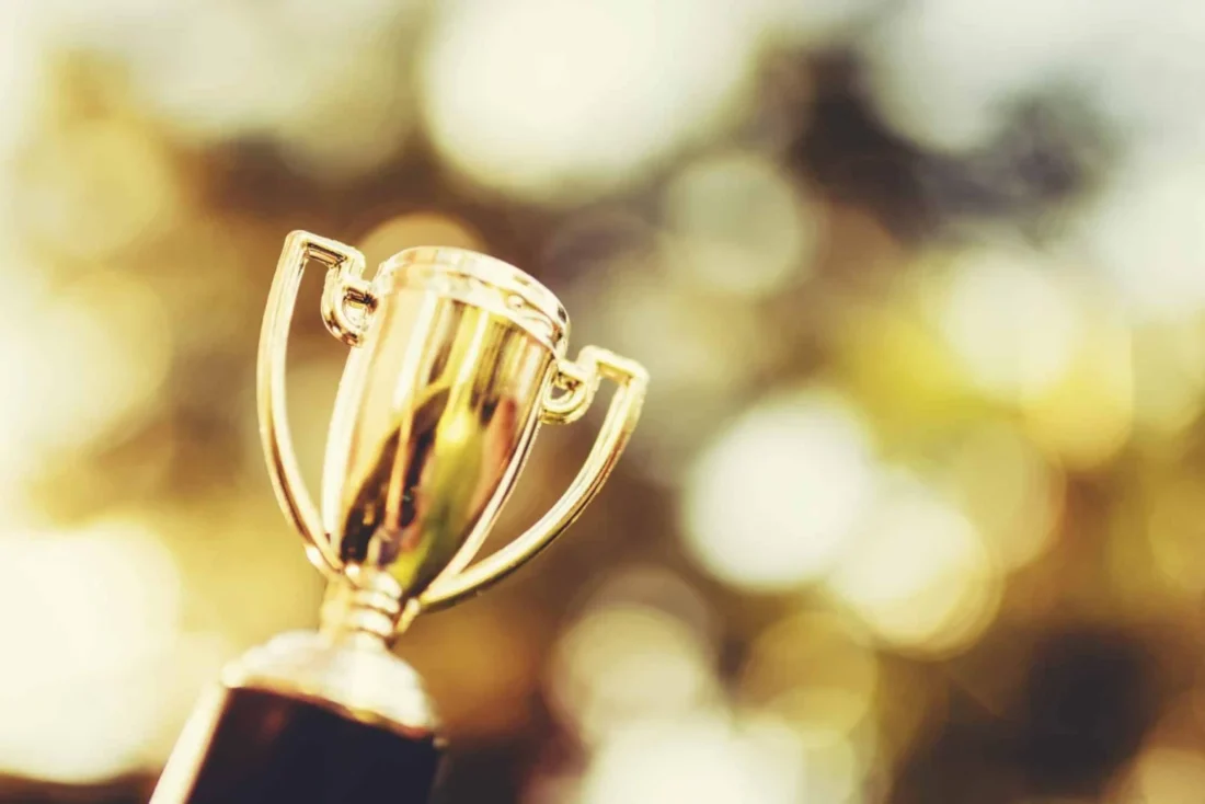 Golden trophy symbolizing the PR value of awards and third-party recognition.