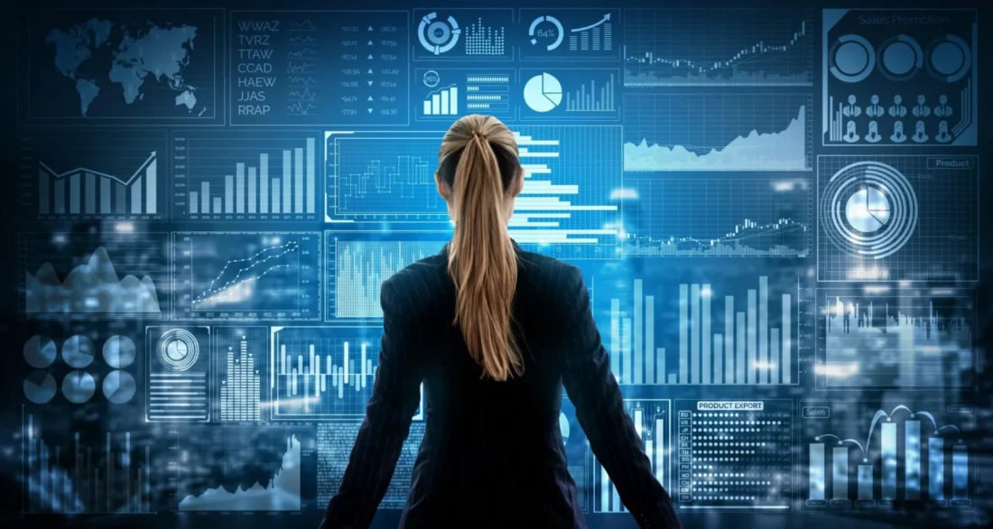 Businesswoman analyzing digital dashboards filled with charts and analytics data, representing analyst relations market positioning and strategic business insights.